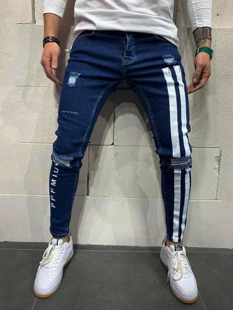 Loch Color Block Bleistifthose Reißverschluss Herren Freizeitjeans