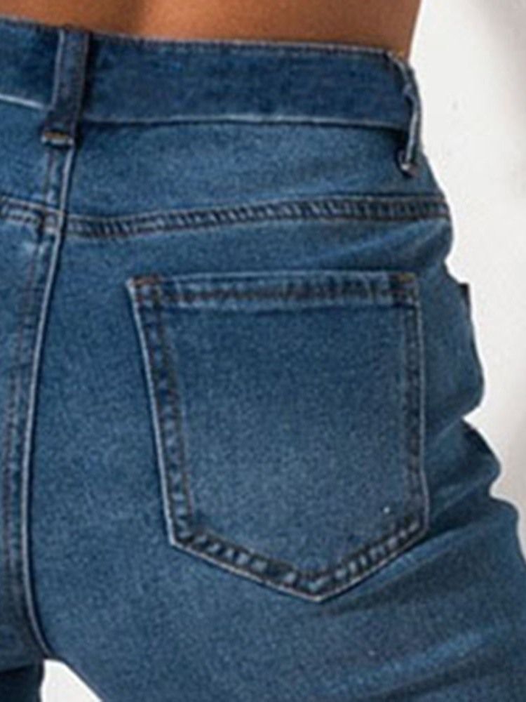 Schlanke Mittelhohe Jeans Mit Schlichtem Loch Für Damen